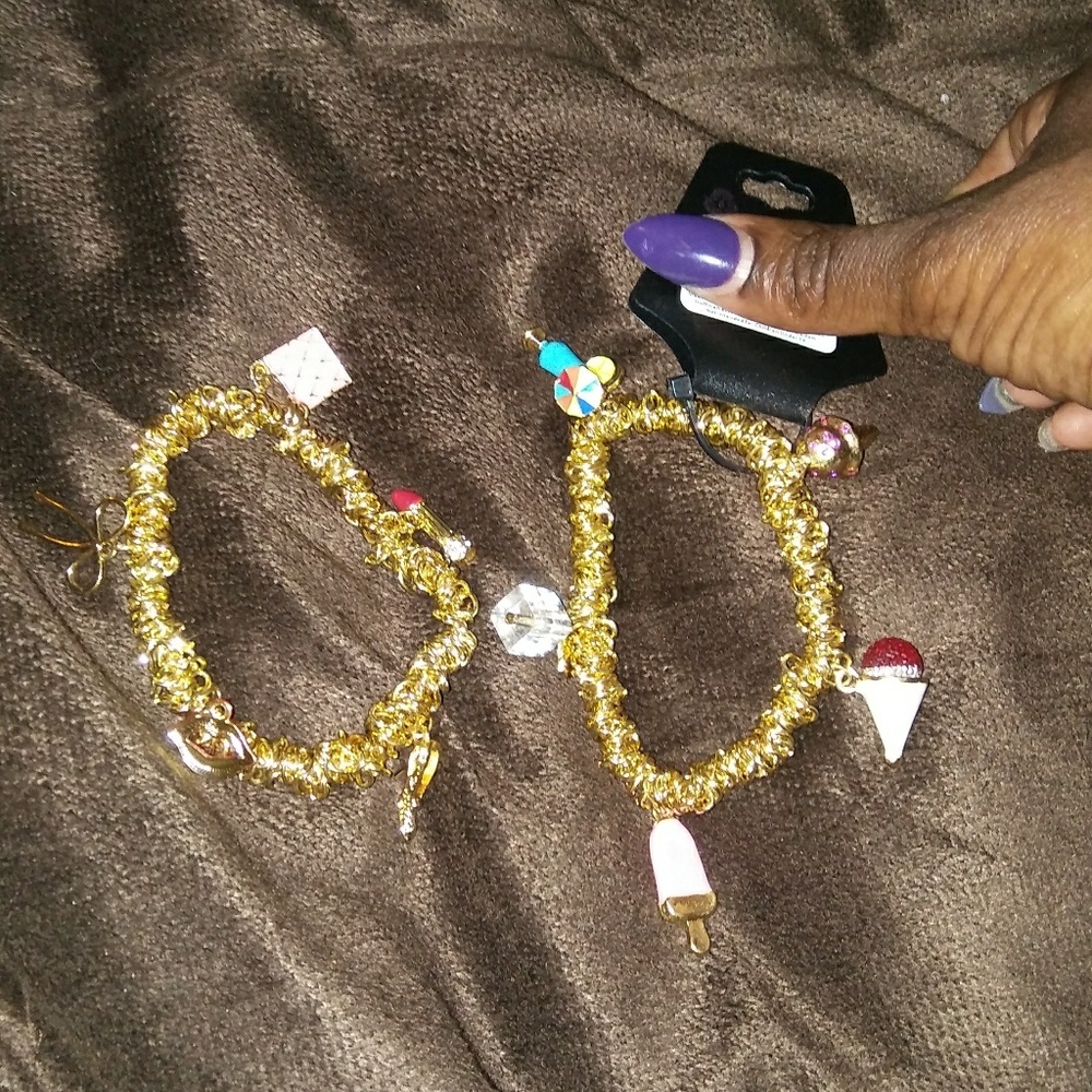 2 charm bracelets. New
